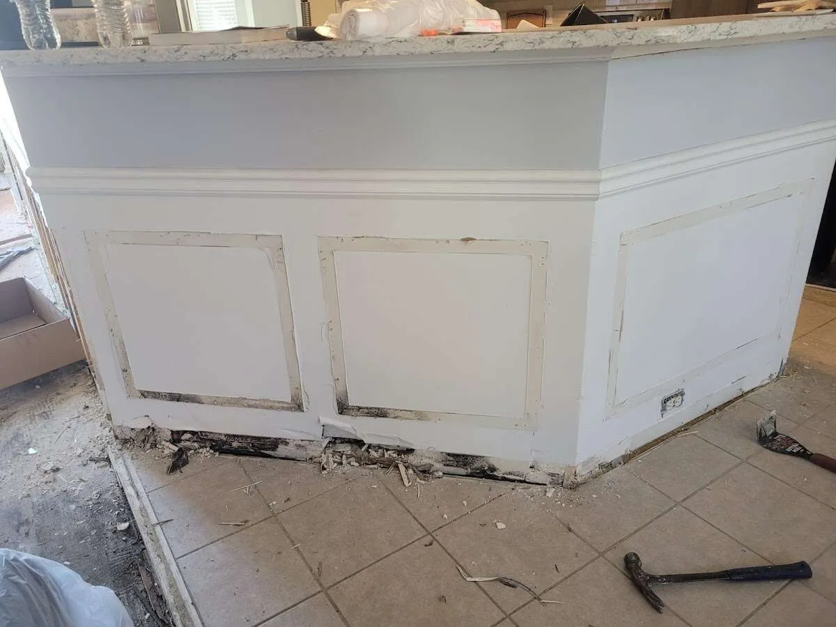 Water damage and mold on kitchen during Storm Damage Restoration in Clute